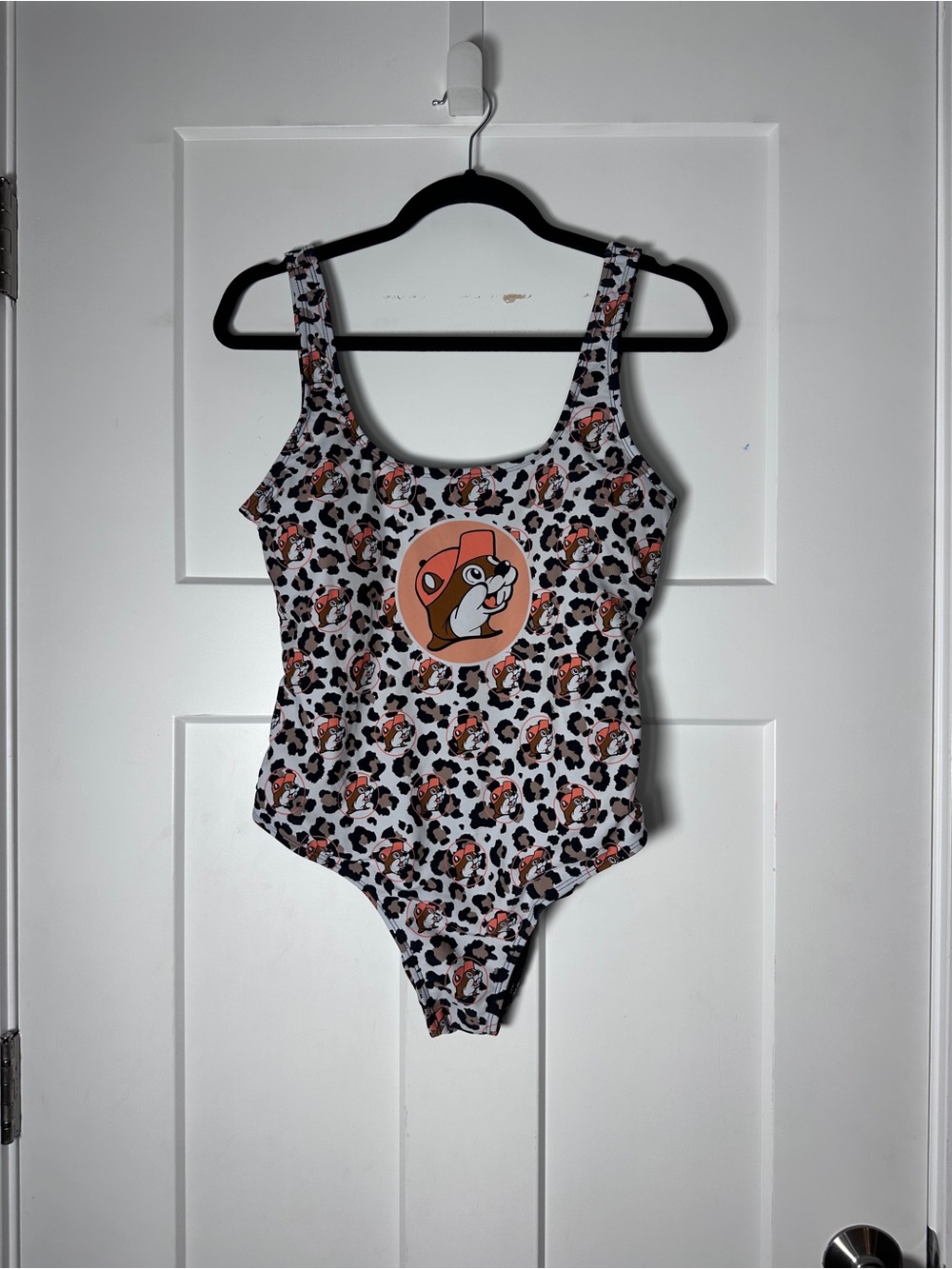 Buc-ee’s White and Orange Leopard Print One-Piece Swimsuit Character Graphic